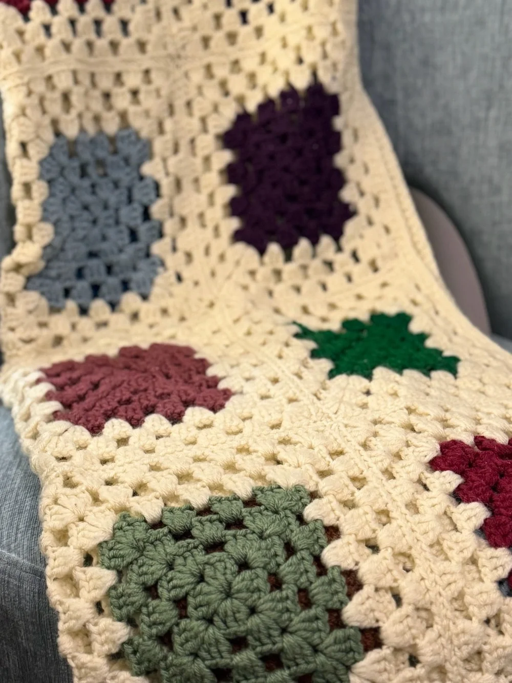 Cozy Crochet Granny Square Throw Blanket in Cream with Colorful Accents